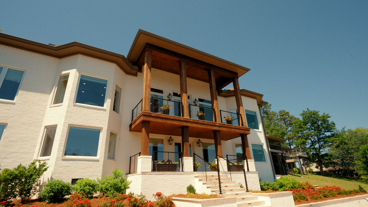 Stacked balconies with cedar columns on a Baker Company home